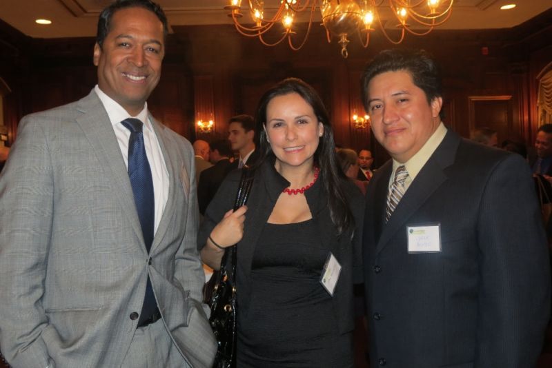 Three people including two men and woman networking at Annual Members Meeting 2012
